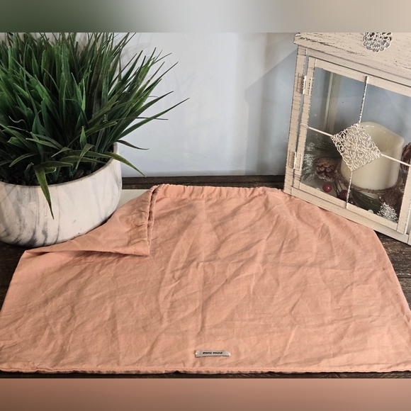 Miu Miu Handbags - Miu Miu Peach Drawstring Dust Bag